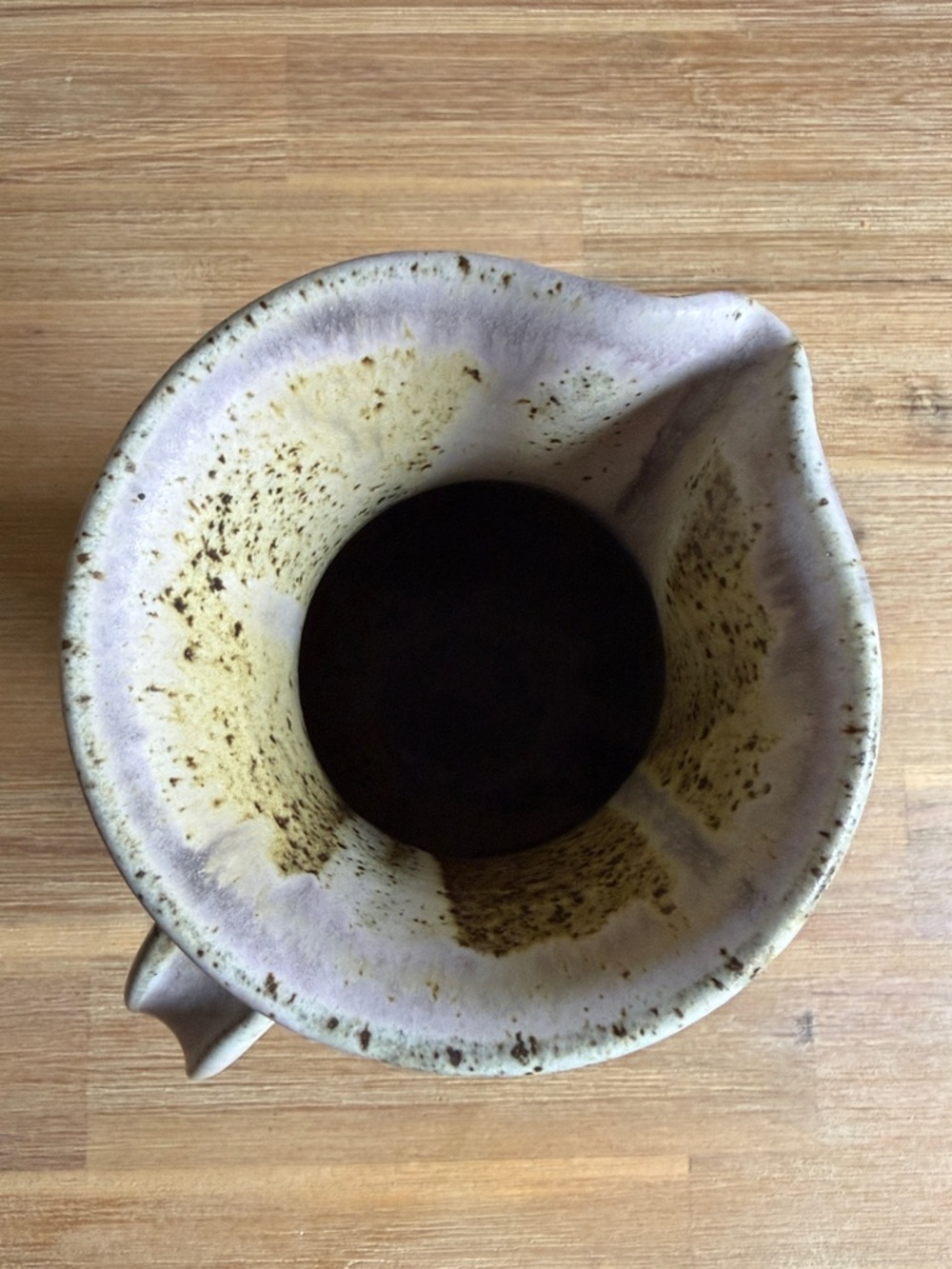 Handcrafted Speckled Ceramic Pitcher in Beige with Blue Stripe - Picture 9 of 13